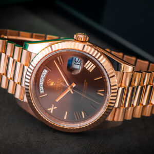 Rolex Day-Date 40 President 228235 Chocolate Roman Dial 18k Rose 40mm/Complete